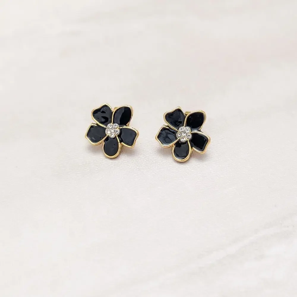 Black Enamel Small Flower Small with Clear Gem Accents Clip On Earrings